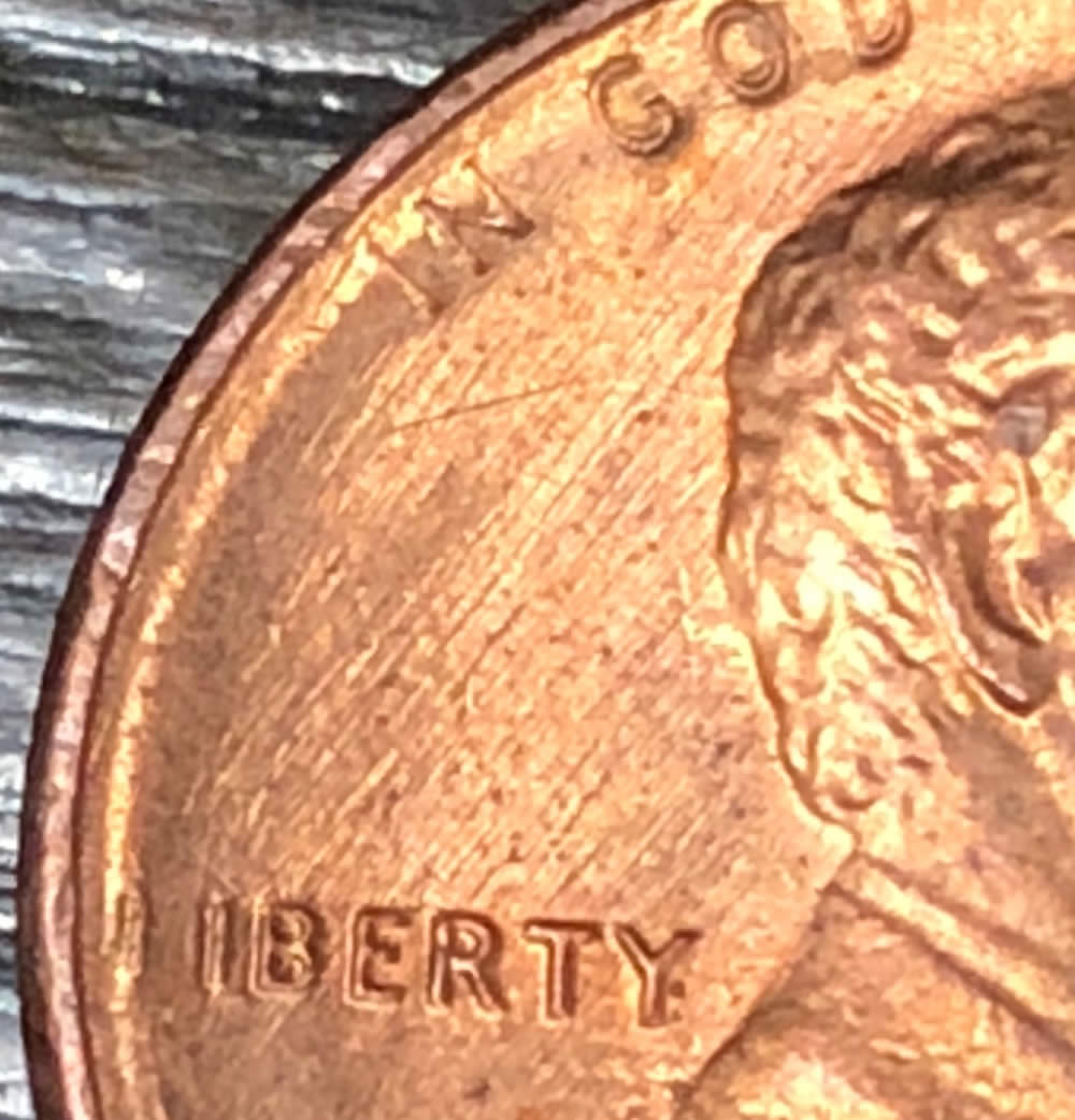 1984-LMC-Half-Of-L-In-Liberty-Missing.