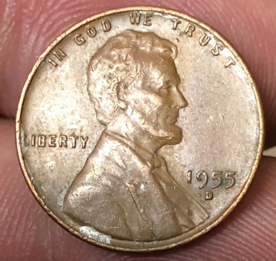 1955-D-Wheat-Penny.-Silver-On-Obverse-Along-The-Rim.