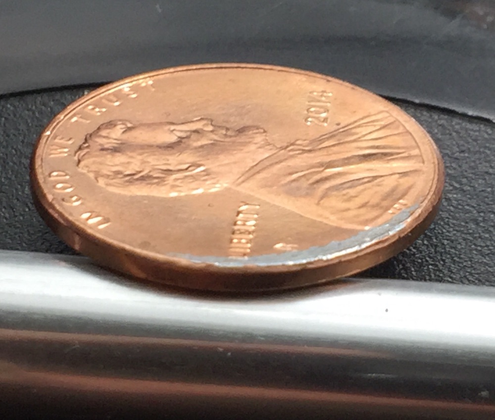 2014-Shield-Cent-Struck-Through-Damaged-Planchet