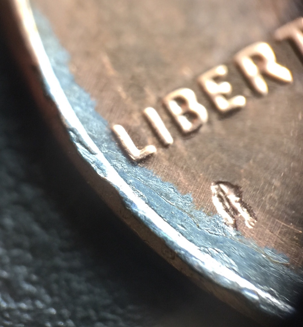 2014-Shield-Cent-Struck-Through-Damaged-Planchet