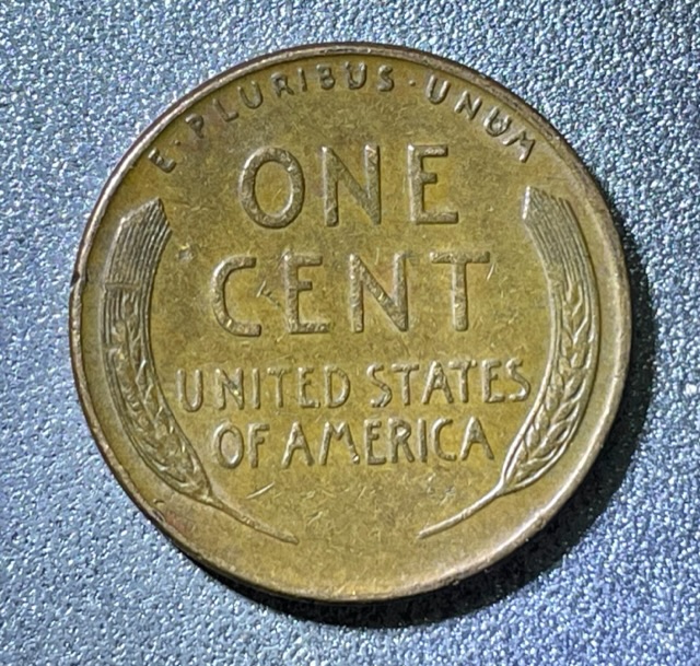 1957-D-Wheat-Penny-With-Blob-On-9