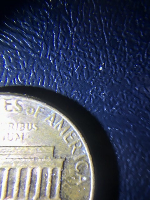 Is-This-A-1982-Error-Coin?Runs-From-Corners-Of-Building