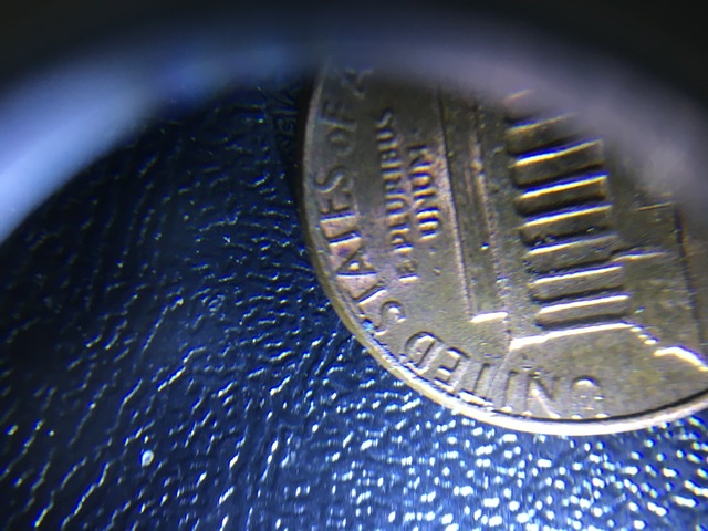 Is-This-A-1982-Error-Coin?Runs-From-Corners-Of-Building
