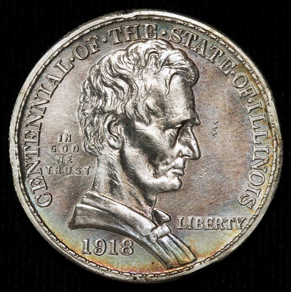 Is-This-Cud-Or-PMD-On-Lincoln-Illinois-Centennial-Half-Dollar?