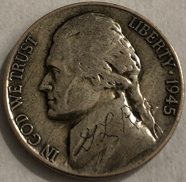 Scribbles-Or-Something-Interesting-On-1945-Silver-Nickel?
