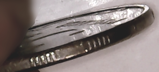 Pretty-Cool-Foreign-Coin-In-My-My-Quarter-Roll---What-Is-It?