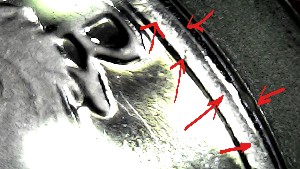 1979-S-Half-Dollar,-Type-1,-Struck-Through-Metal-Shaving-Error-On-Cheek-And-Railroad-Rim-Value