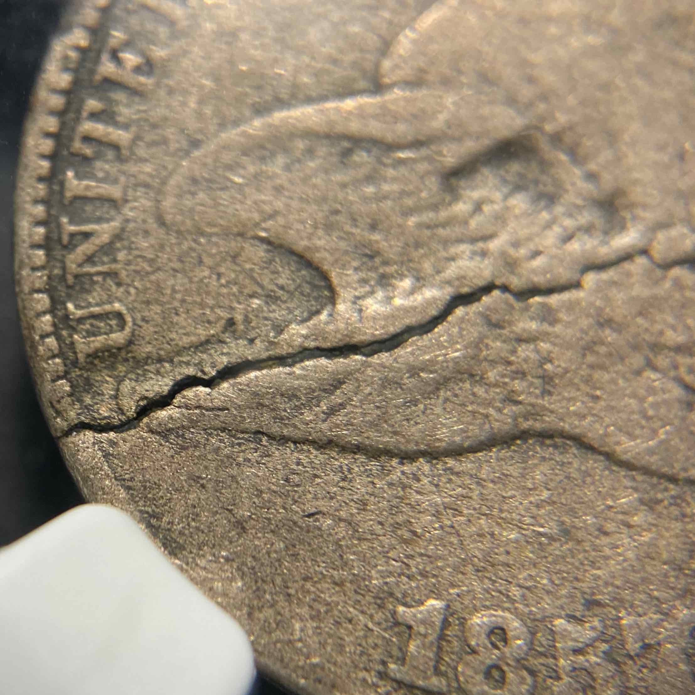 1857-Flying-Eagle-Cent--~85%-Cracked-Planchet-NGC-F15