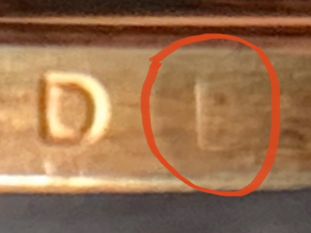 2019-D-Sacajawea-One-Dollar-Coin-Weird-Marks,-Extra-Letters-On-Edge-Of-Coin