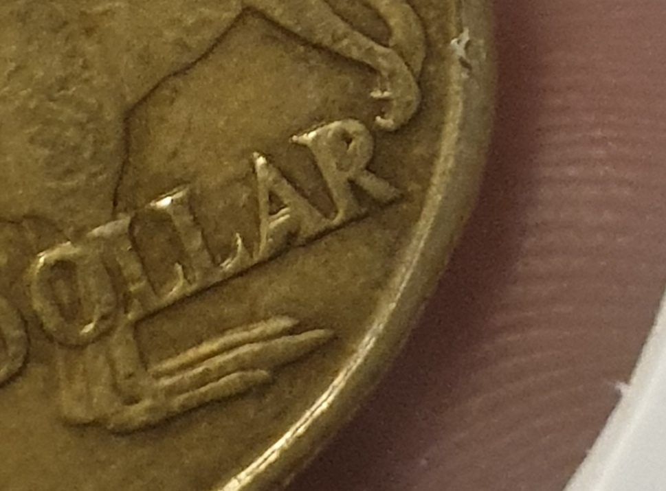 1984-1-Dollar-Coin-Cuds-In-Letters-Reverse
