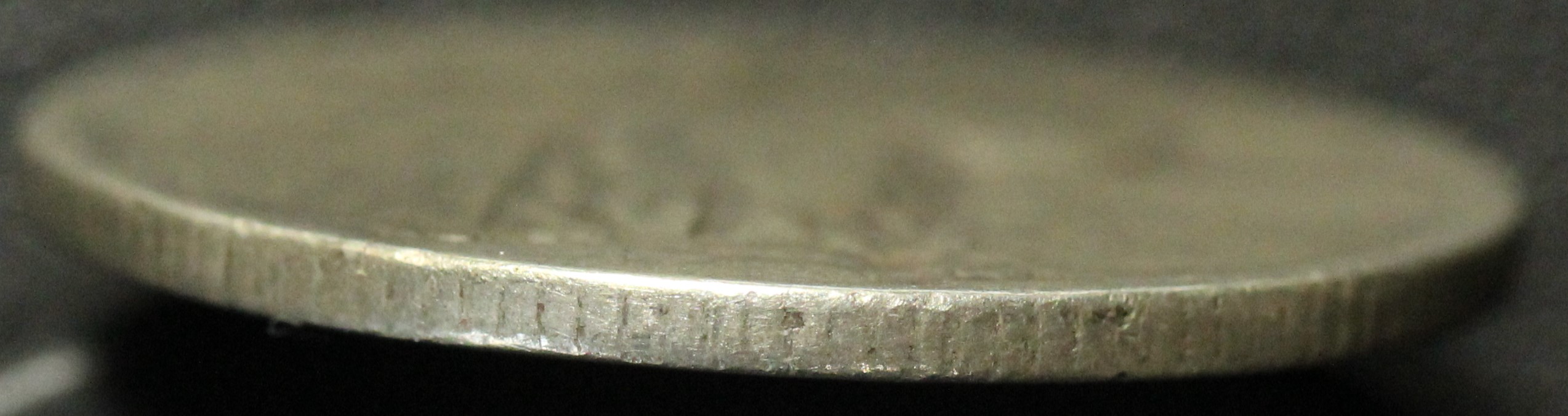 19xx-S-Standing-Liberty-Silver-Quarter-Cud-Error---What-Do-We-Think?