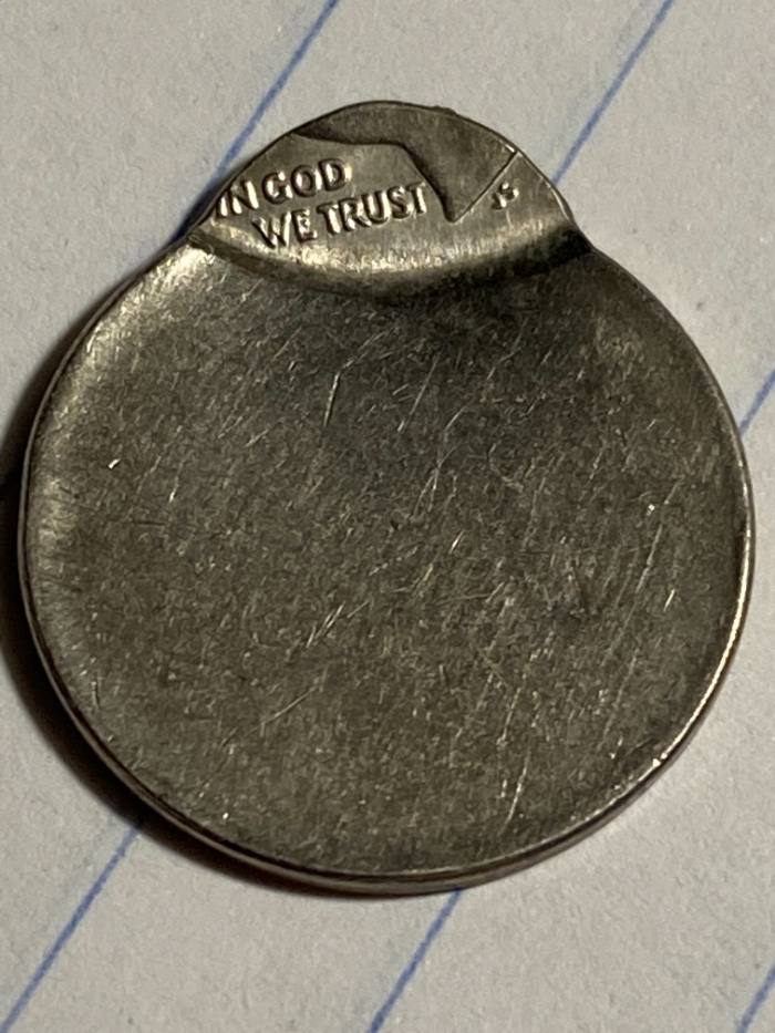 First-Heavy-Off-Center-Strike-Dime