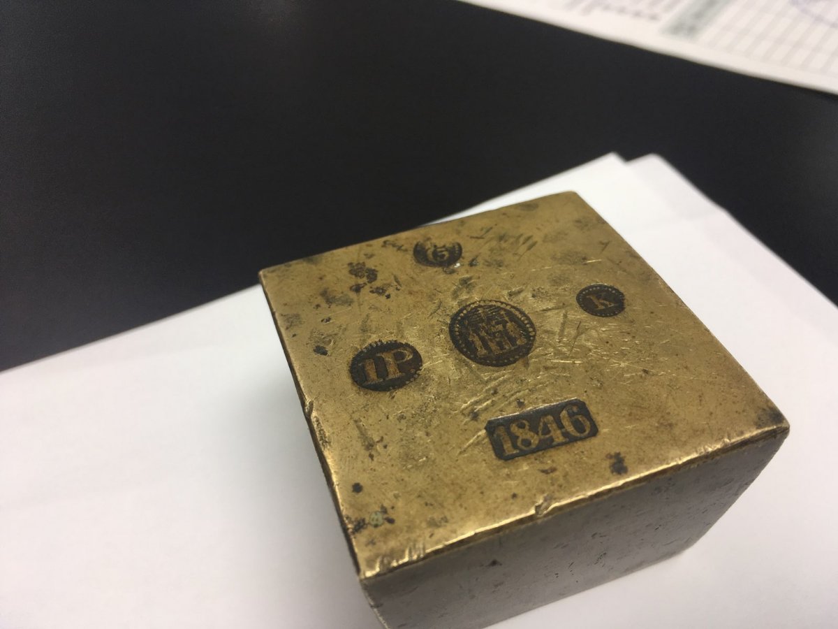 Unique-Artifact-Found-In-Building-Demolition-Id:-Silver-Ingot-Or-Clock-Counterweight