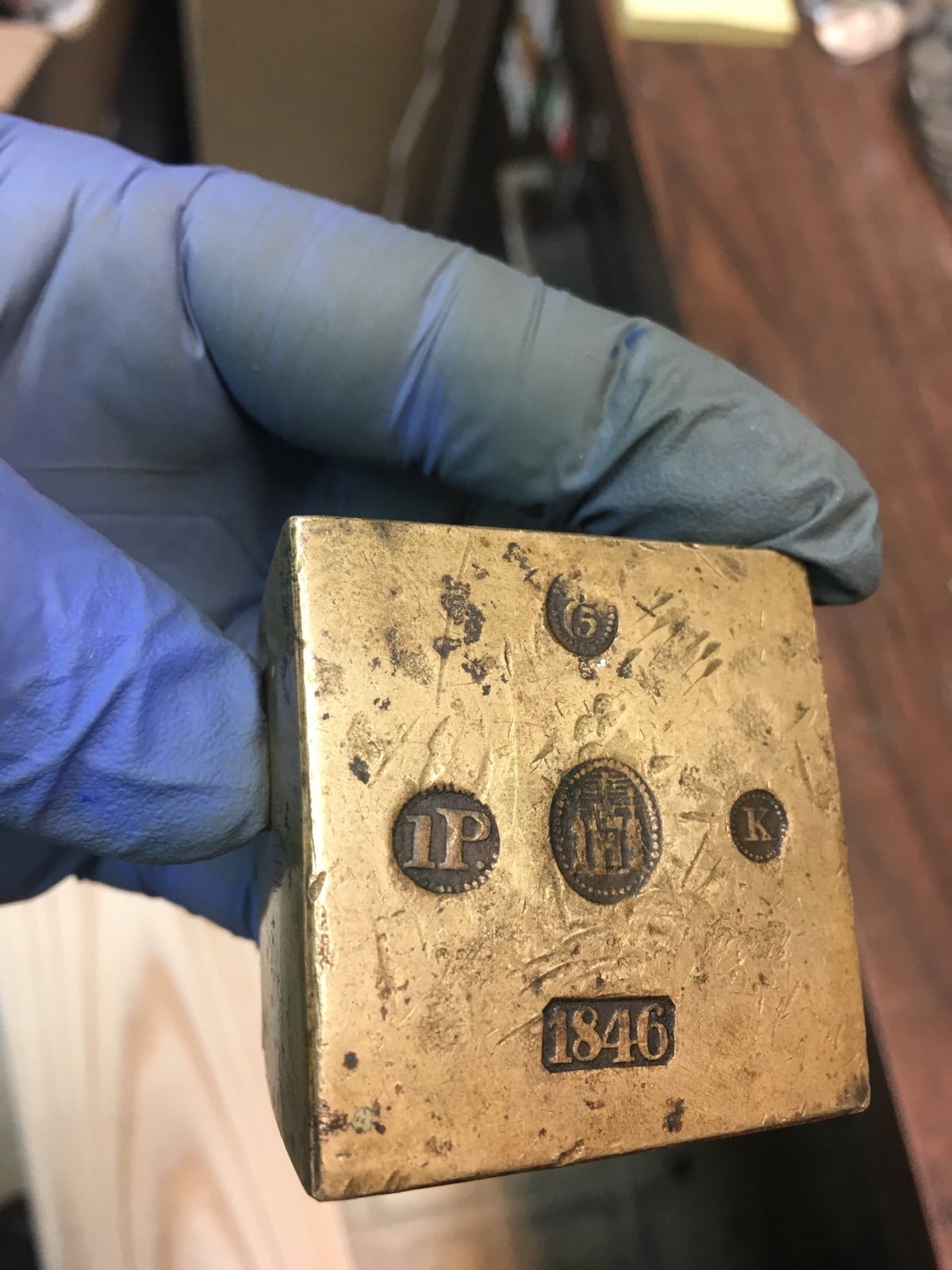 Unique-Artifact-Found-In-Building-Demolition-Id:-Silver-Ingot-Or-Clock-Counterweight