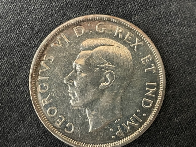 Help-Me-Grade-This-1948-Canadian-Dollar.