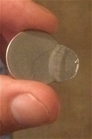 Off-Center-Nickel-With-Reverse-Brockage-Nose-And-Mouth-Only-Showing