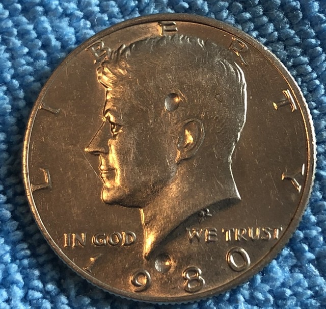 1980-D?-Kennedy-Half-Dollar-With-Strange-Smooth-Dents.-Error-Or-PMD?