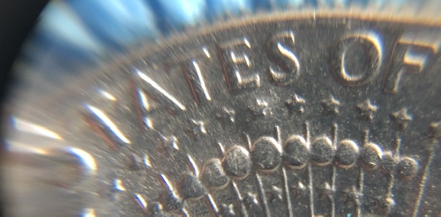 1980-D?-Kennedy-Half-Dollar-With-Strange-Smooth-Dents.-Error-Or-PMD?