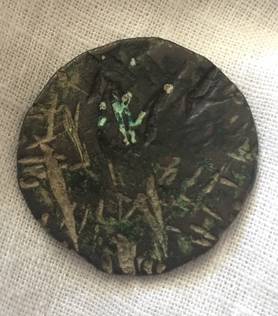 Strange-Looking-Coin-With-Line-Markings