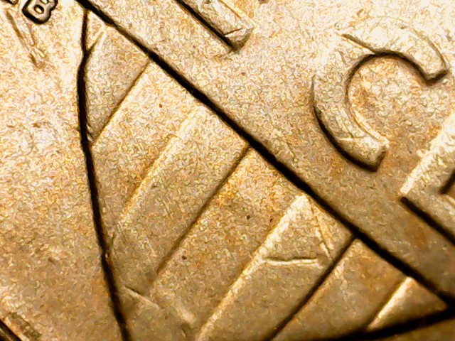 2013-Lincoln-D-Shield-Die-Cracks-Reverse