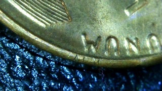 1958-Wheat-Penny-With-Part-Of-Lettering-Stamped-On-Rim/Edge?