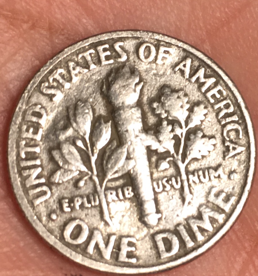 1987-Dime-D-Has--Abnormal-Face-And-Circle-On-Neck.-Number-6-And-Letter-S-In