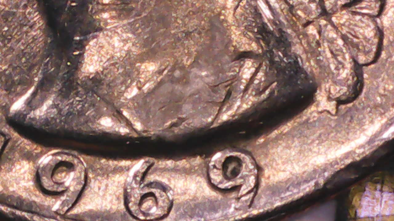 1969-D-Quarter-Damage-Or-Strike-Through?