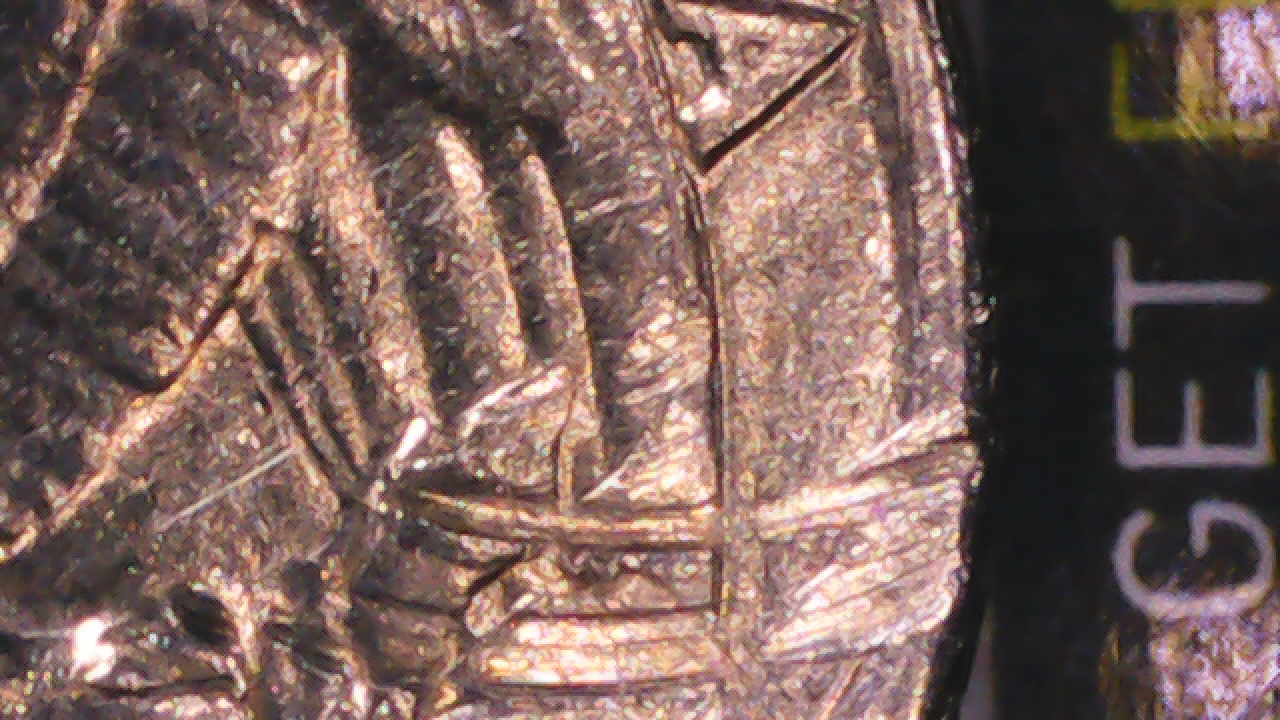 1969-D-Quarter-Damage-Or-Strike-Through?