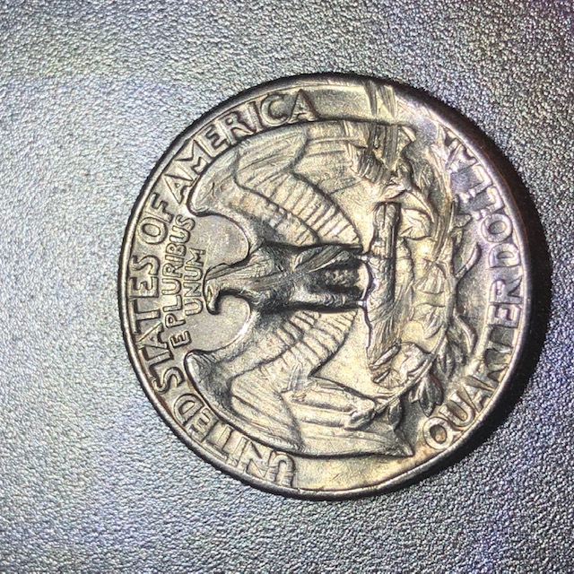 1969-D-Quarter-Damage-Or-Strike-Through?