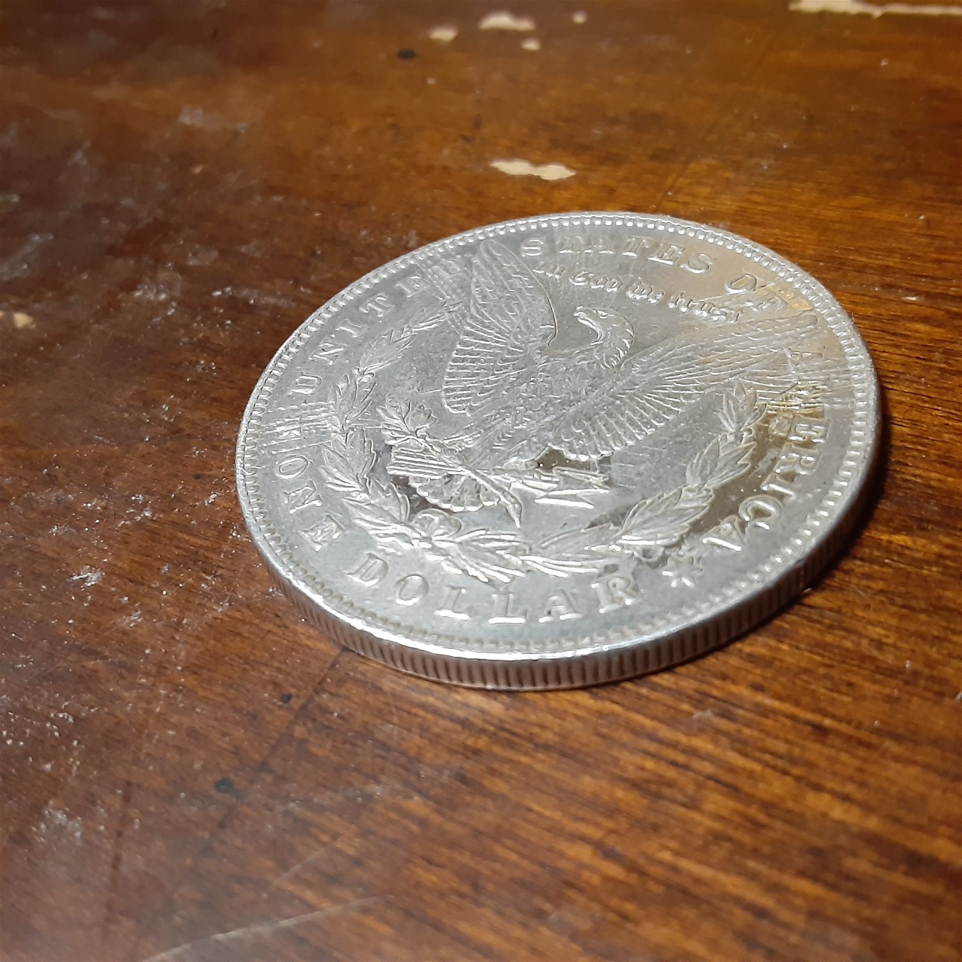 1878-P-Morgan-7-Tf-With-Some-Crazy-Lines-On-Back-Of-Coin?-Not-Scratched