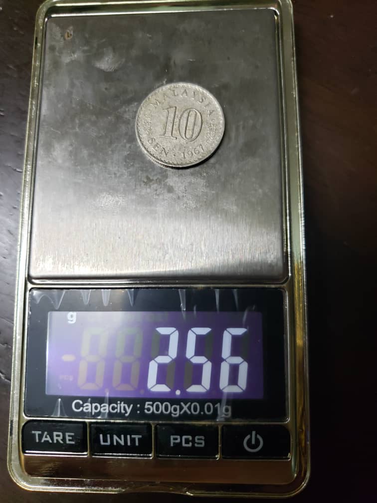 Is-This-Coin-Wrongly-Placed-Into-A-Pure-100-%-Nickel-Planchet?