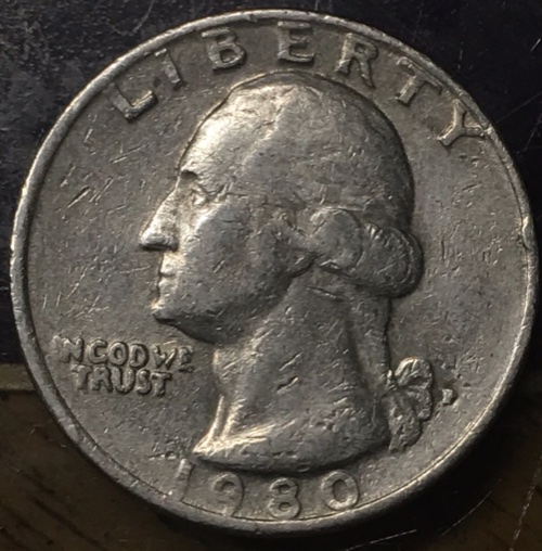 1980-Quarter-Struck-Unevenly?
