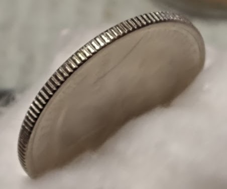 2018-Quarter-Struck-Through-Large-Rim-Burr