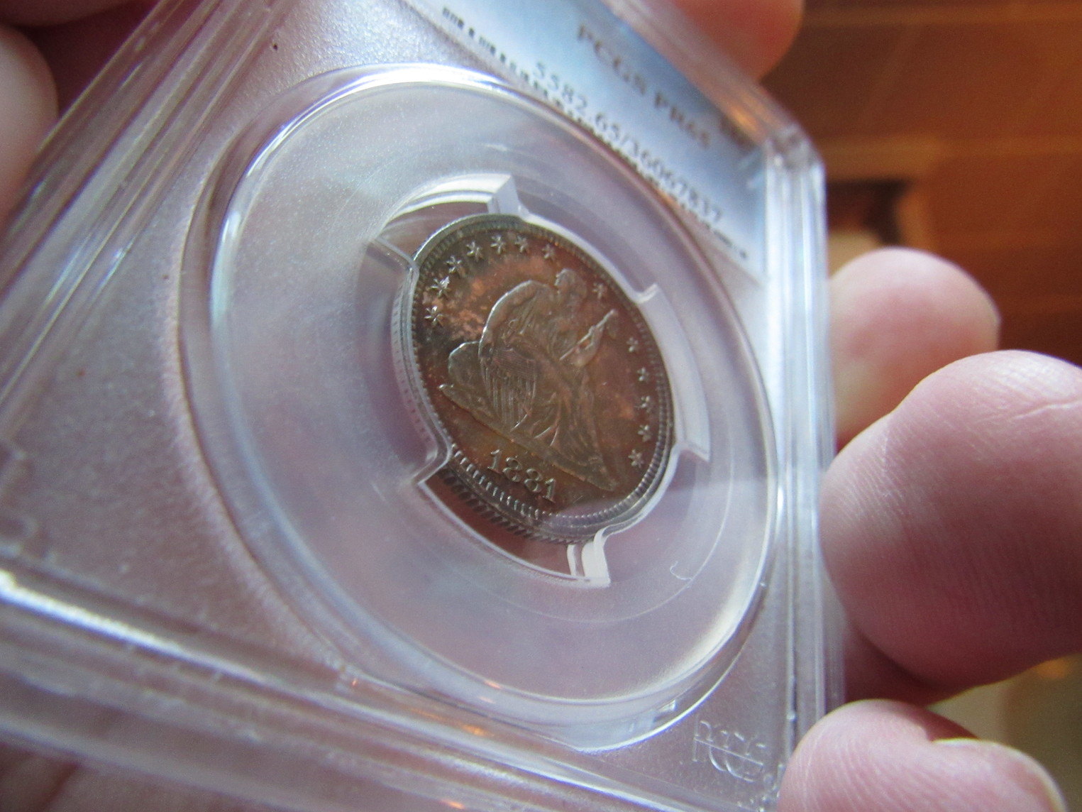 1881-Proof-Seated-Liberty-Quarter-PF-65-&-Its-Compliment-1881-IHP-Proof
