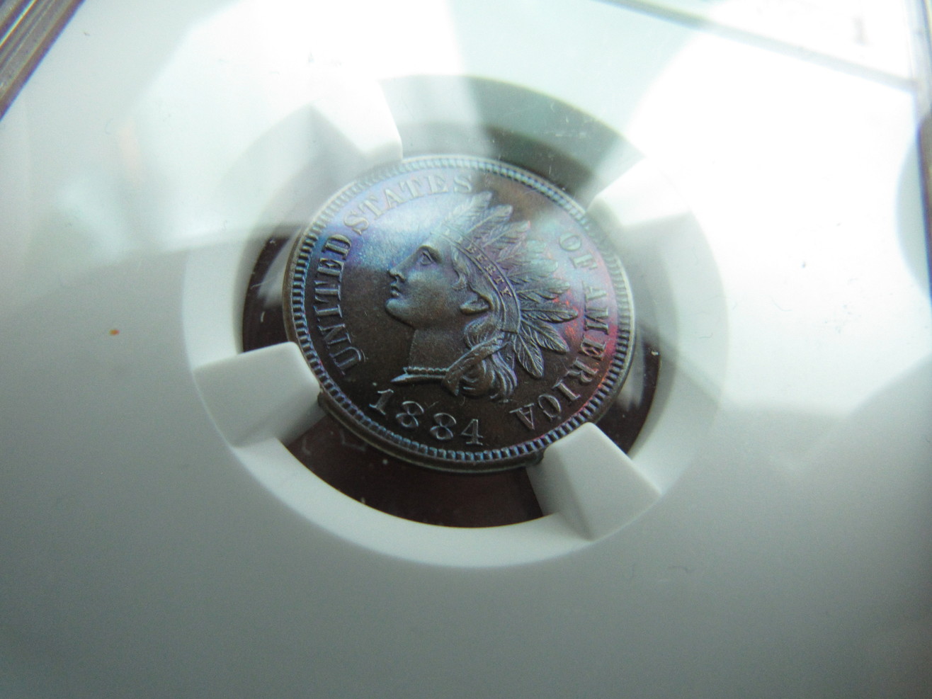 1884-Indian-Cent-PR-65-BN---NGC---Colorful--A-Different-One