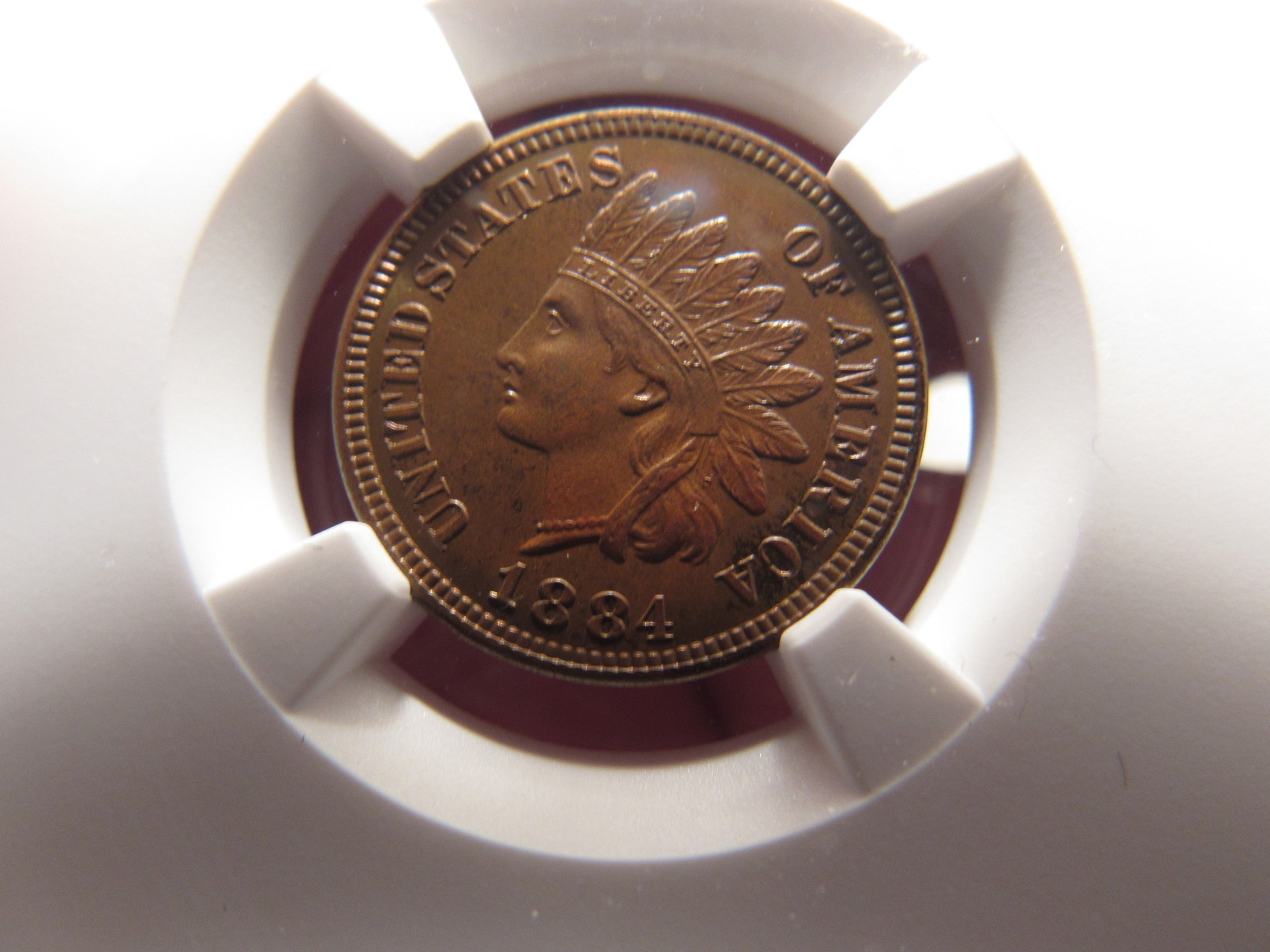 1884-Proof-65-IHP-Brown-With-Nice-Color