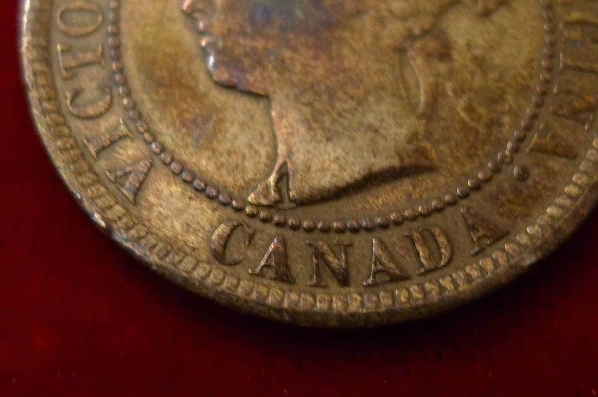 1888-Canada,-One-Cent-,-Counterstamped-Coin-?