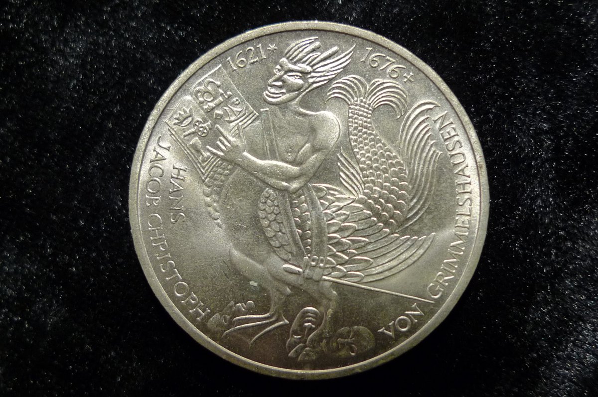 Post-Your-Coins-With-Unusual,-Bizarre,-Or-Eerie-Images
