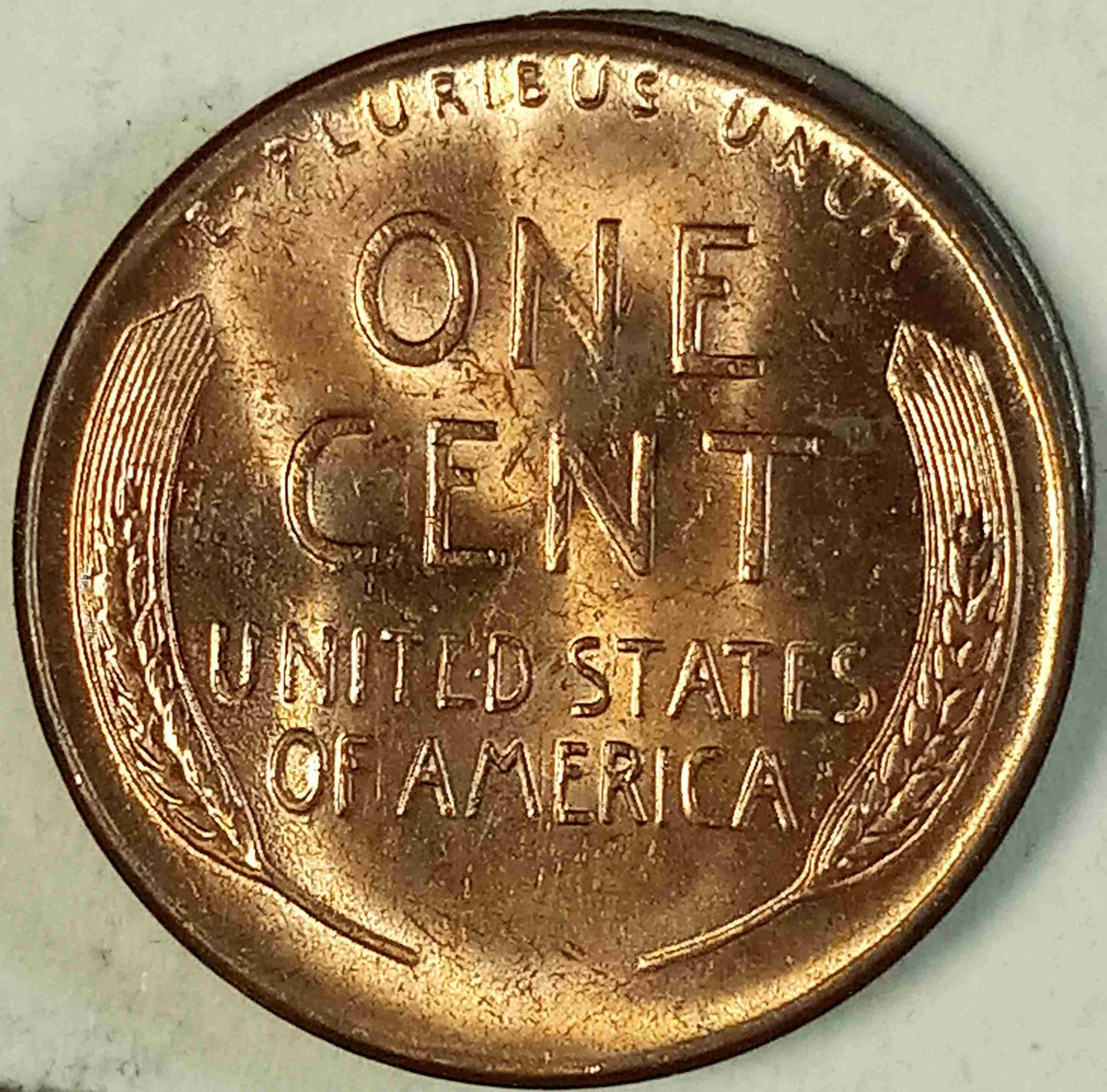 1956-D-Unc--LWC-W/Ridb-Obv.-&-Ghosting-Pidt-Reverse.