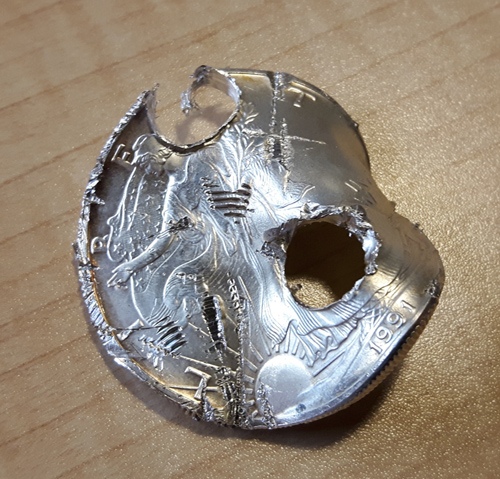 Ugliest,-Heavily-Damaged-Silver-Eagle-Coin-Ever,-Scrap-Silver-Coin