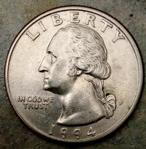 Found-This-1994-P-Quarter.with-Extra-Line-Of-Metal?