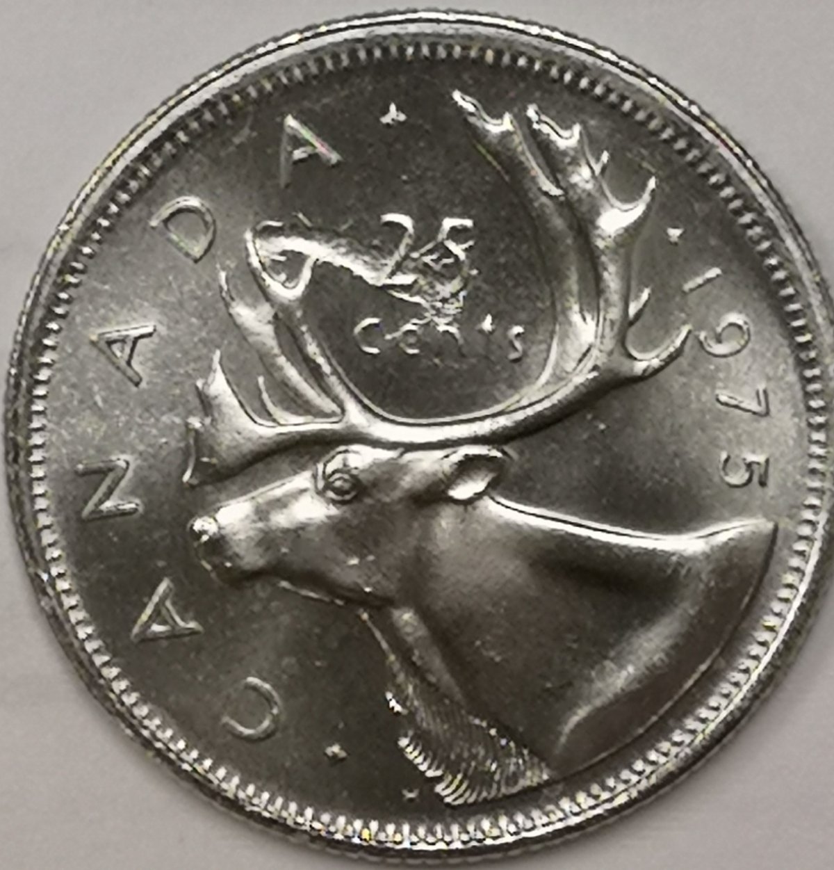 1975-25-Cents-Struck-Through-Wire?