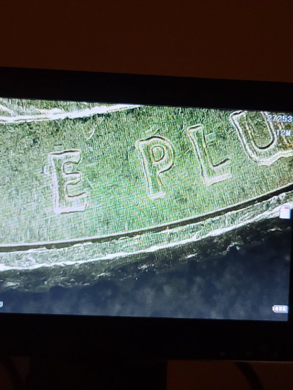 Ghost-Like-Letters-Or-Numbers-Behind-E-Plu-On-2019-River-Of-No-Return