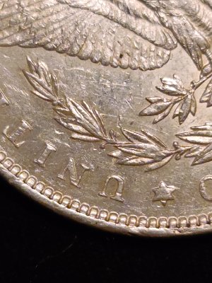Clashing-All-Over-This-1889-Morgan-Dollar?