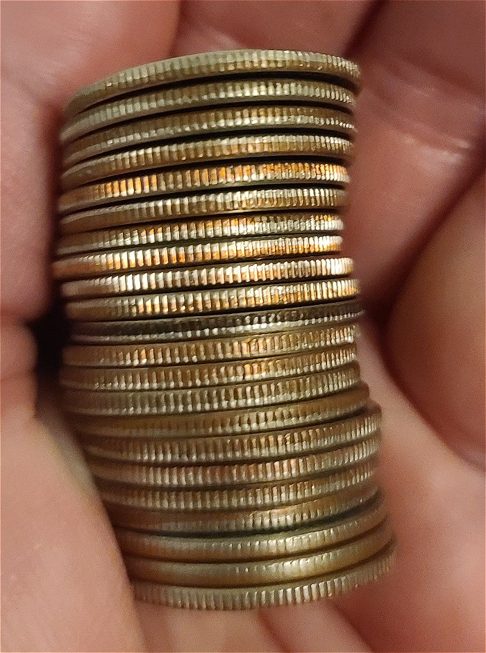 What-Causes-The-Copper-Color-On-The-Rim-Of-Quarter-To-Turn-Black?