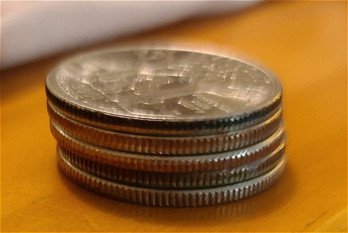 What-Causes-The-Copper-Color-On-The-Rim-Of-Quarter-To-Turn-Black?