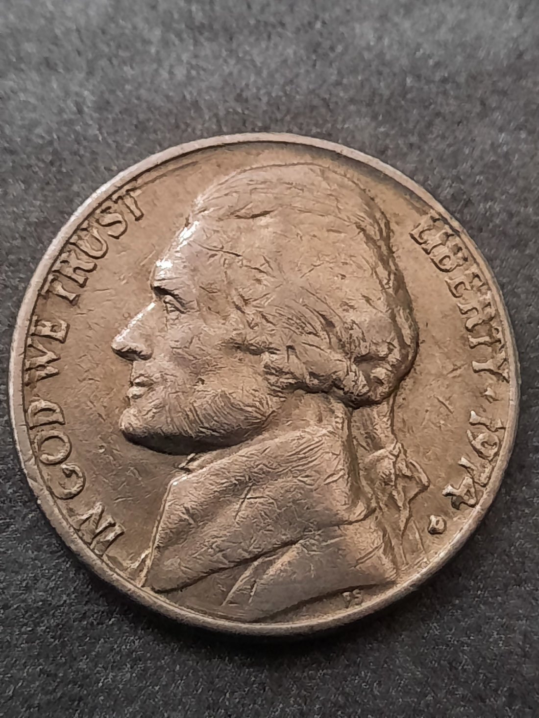 1974-D-Jefferson-Nickel-Odd-Cut-On-Obverse-Need-A-Second-Opinion