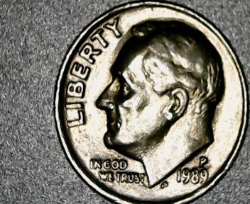 Large-Mole-On-Side-Of-Lip-And-Eye-,-If-Visible.-1989-P-Dime