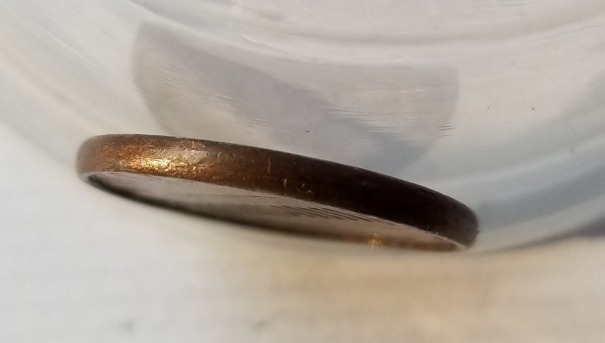 2005-LMC-What-Is-Going-On-With-This-Coin?