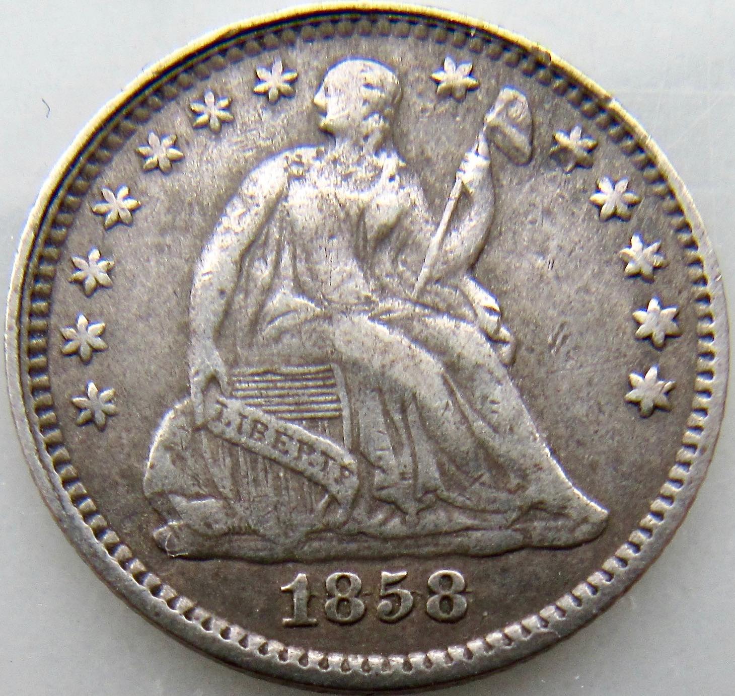 1858-Half-Dime-With-Inverted-Date
